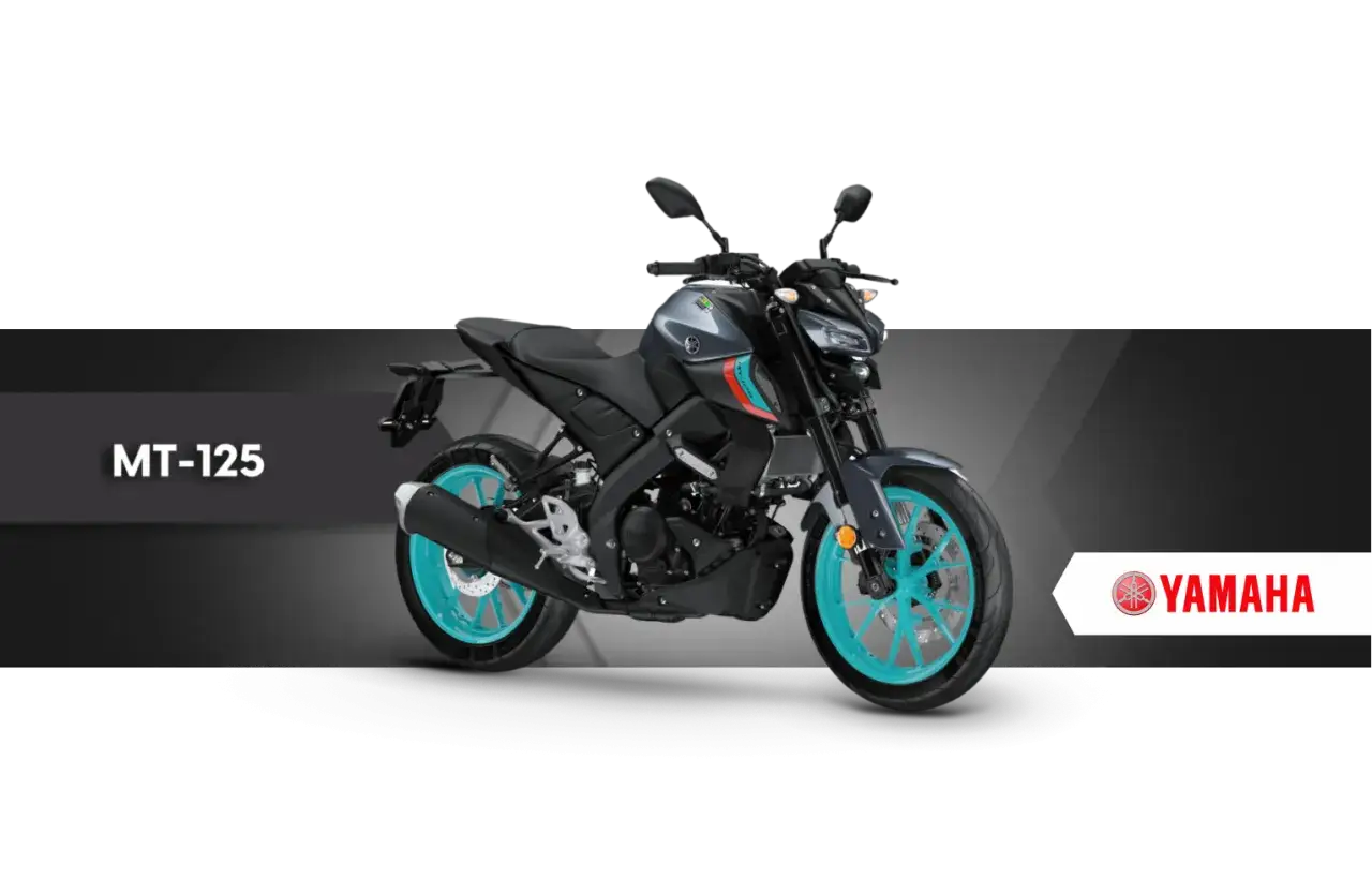 Szary motocykl Yamaha MT-125 z turkusowymi felgami, idealny na pierwsze a1 prawo jazdy.