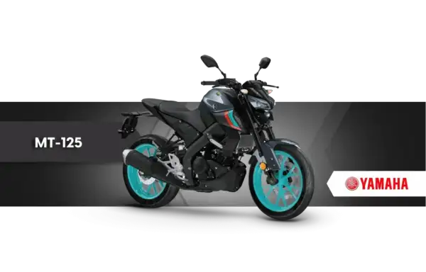 Szary motocykl Yamaha MT-125 z turkusowymi felgami, idealny na pierwsze **a1 prawo jazdy**.